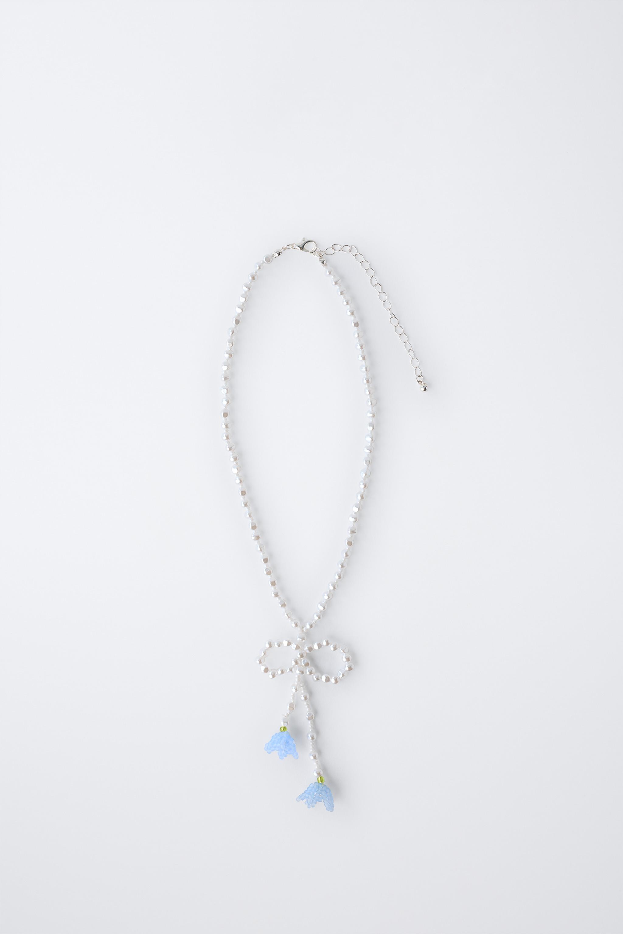 COLLIER PERLES FLEURS FANTAISIE